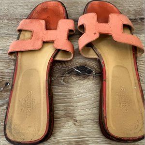 Worn Hermes Oran sandals in coral